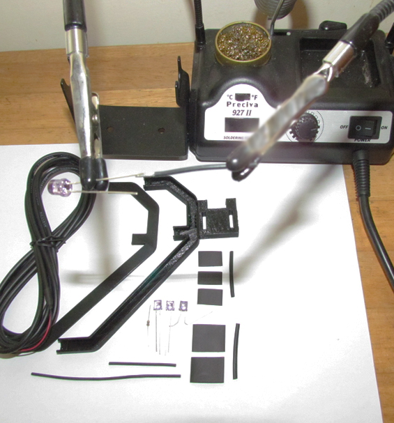 Step by step DIY assembly process for gaming head tracking hardware kits.